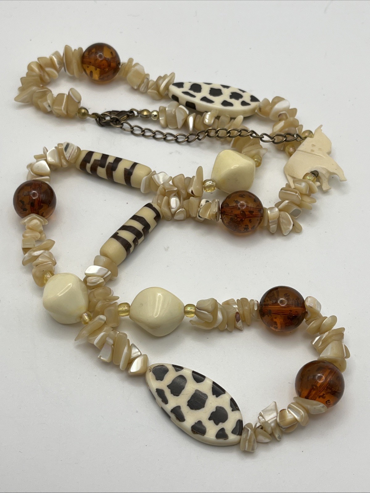 Vintage Shell And Acrylic Animal Print Carved Elephant Asymmetrical Necklace
