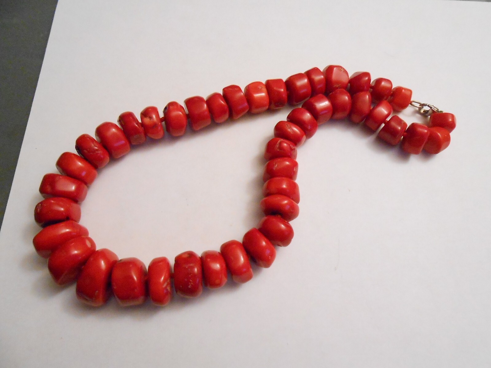 GENUINE UNDYED RED CORAL BEADS NECKLACE WITH STERLING CLASP.