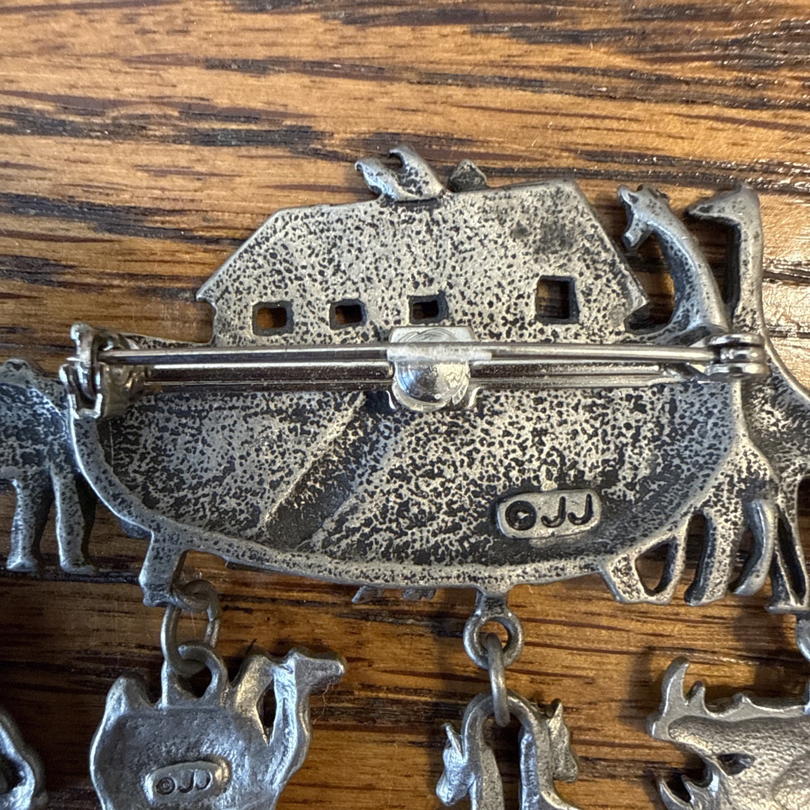 JJ pewter Noah’s Arc pin (brooch) measures approximately 2 3/4”wide