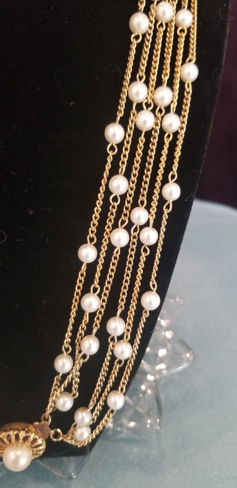 Vintage Faux Pearl And Gold Tone 4 Strand Necklace With Decorative Clasp.