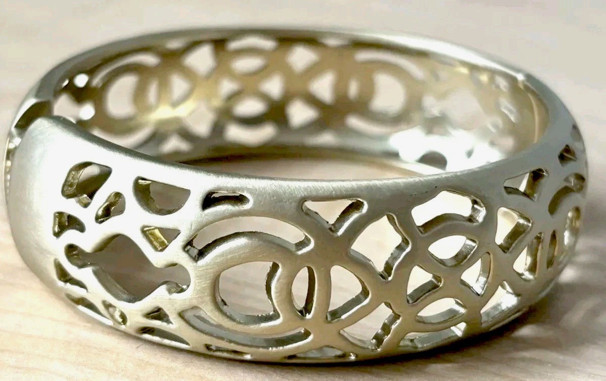 Open filigree hinge bracelet/ brushed antique gold tone/ size 6.75