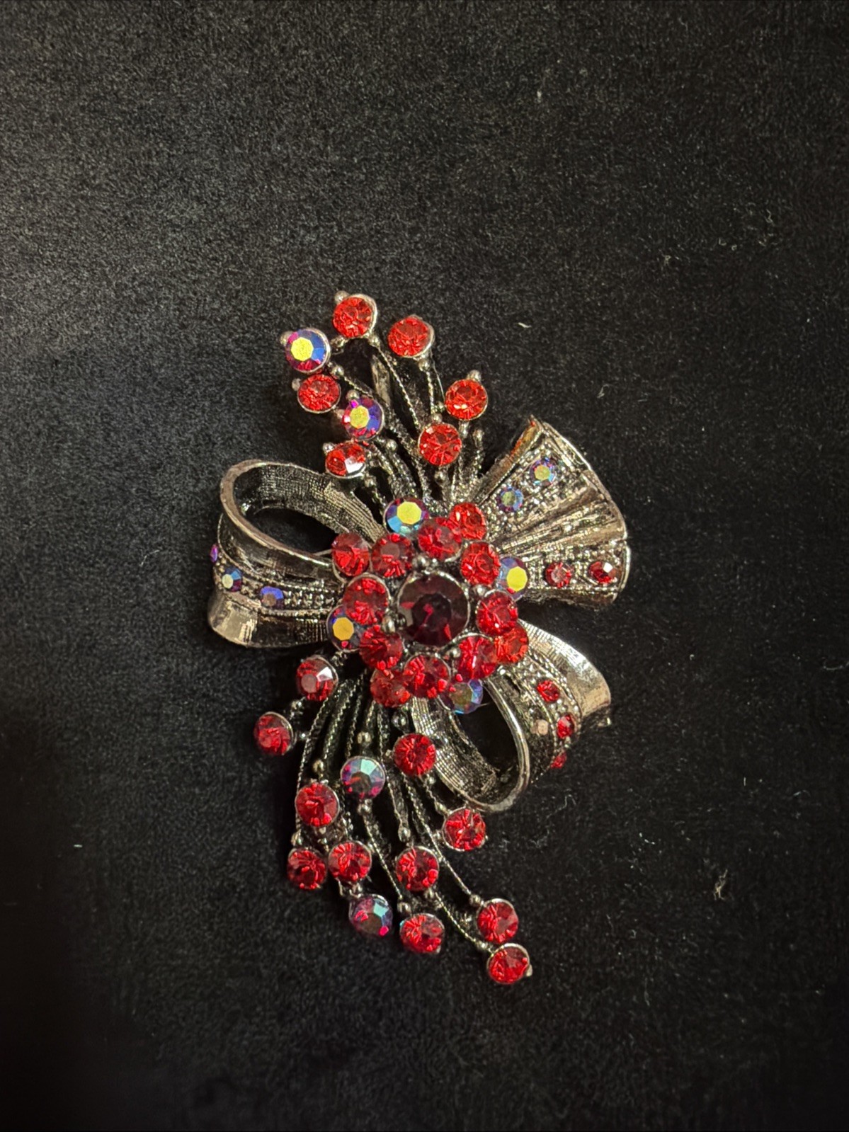 Vintage Bow Brooch Gunmetal-toned With Red Iridescent Rhinestones