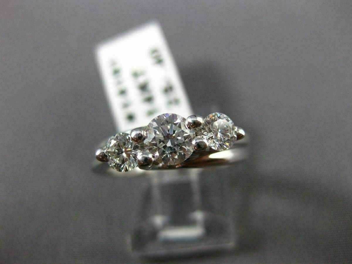 ESTATE .91CT DIAMOND 14KT WHITE GOLD 3D PAST PRESENT FUTURE TENSION RING #14161