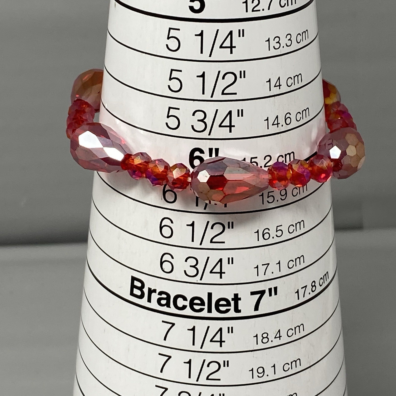 Red Glass Beaded Bracelet Surface Coated Faceted Teardrop Iridescent Stretch 6″