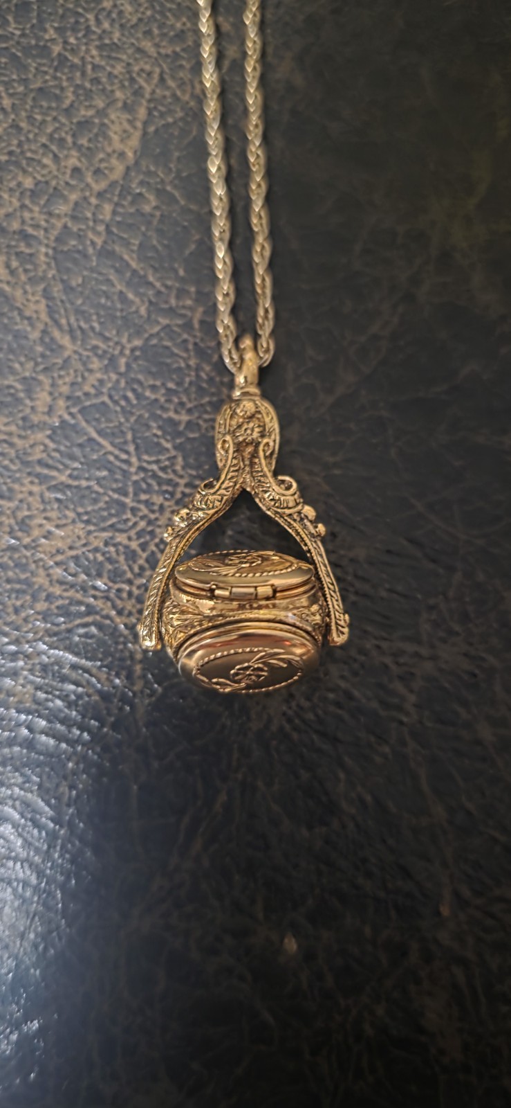 gold-tone vintage-style locket 1928 Jewelry Company 3-sided rotating design