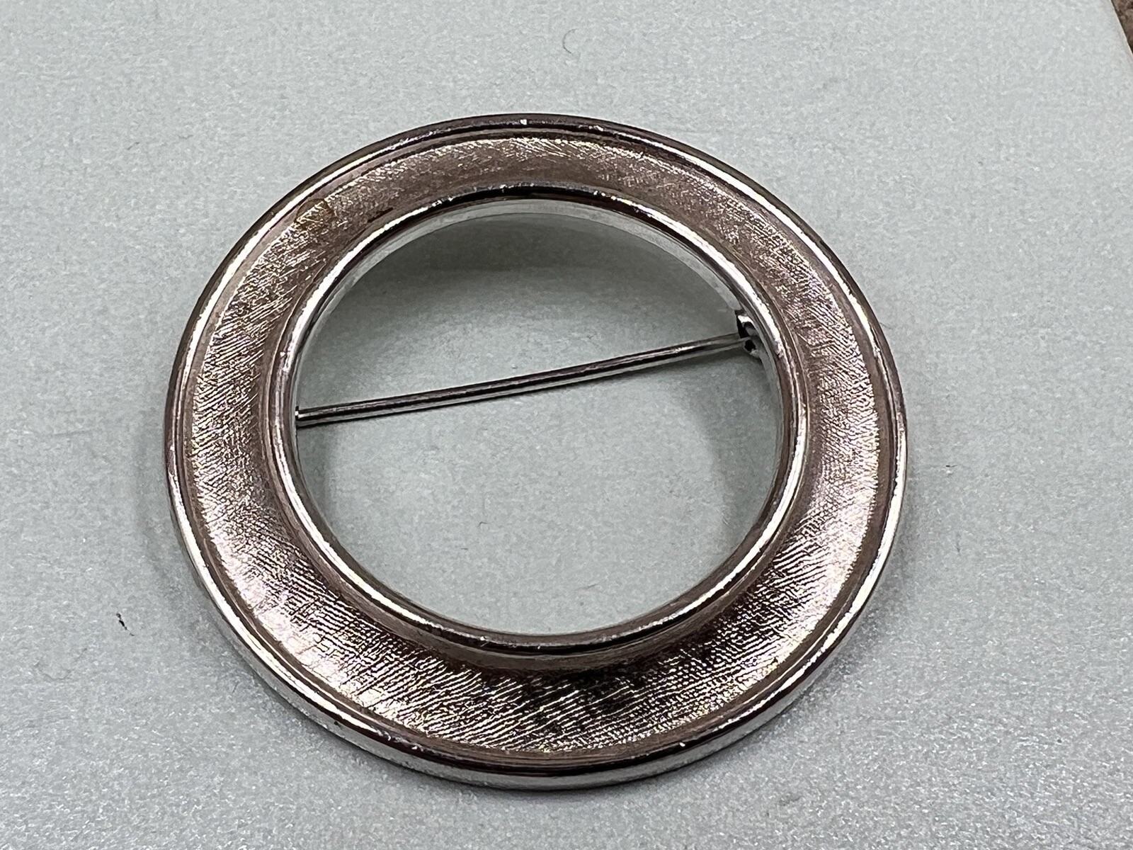 VTG. CROWN TRIFARI BRUSHED SILVER TONE CIRCLE OF LIFE BROOCH 1.53”