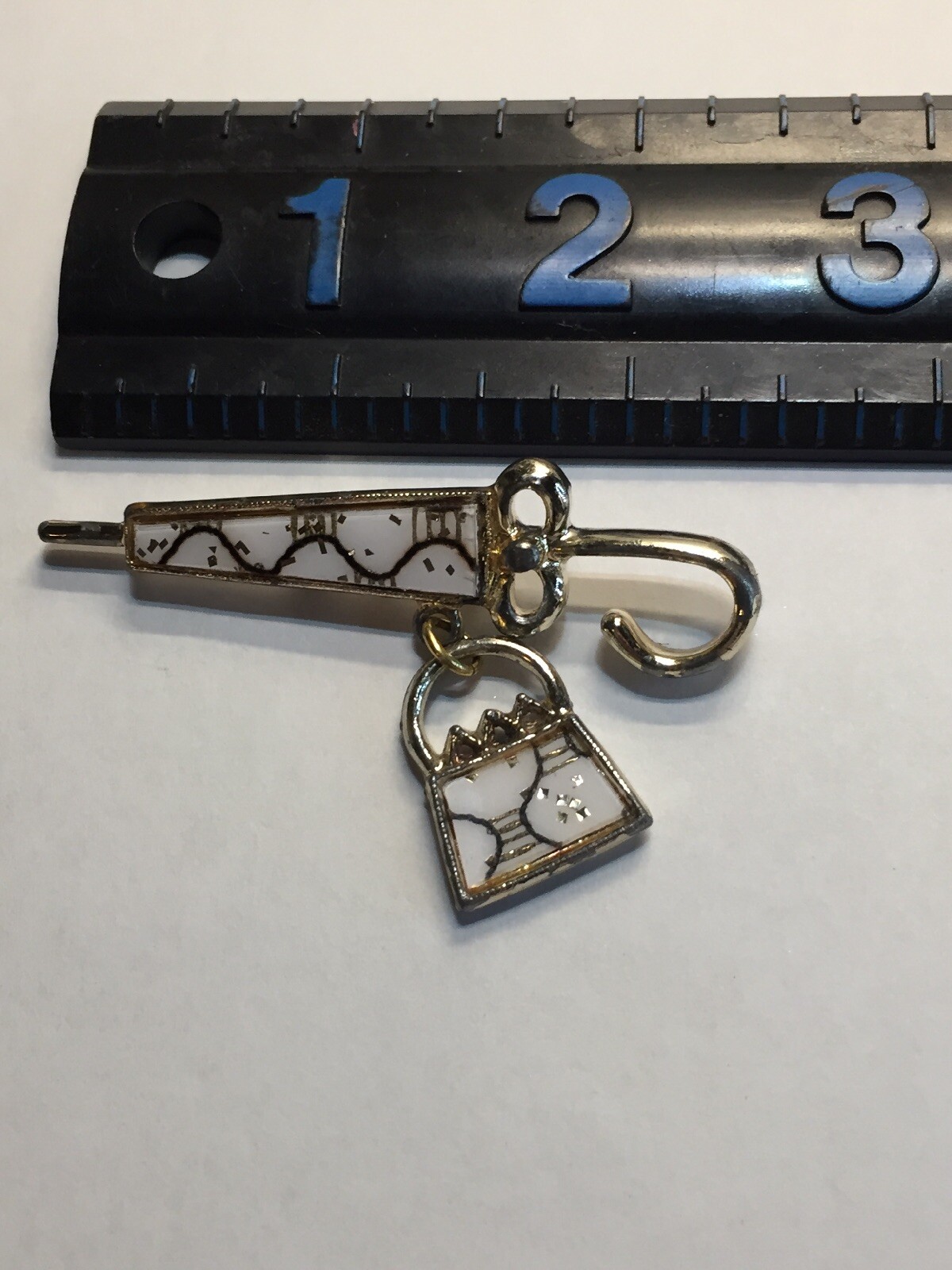 Vintage 2 3/8″ White Gold Enameled Umbrella w/Dangling Purse Brooch Pin