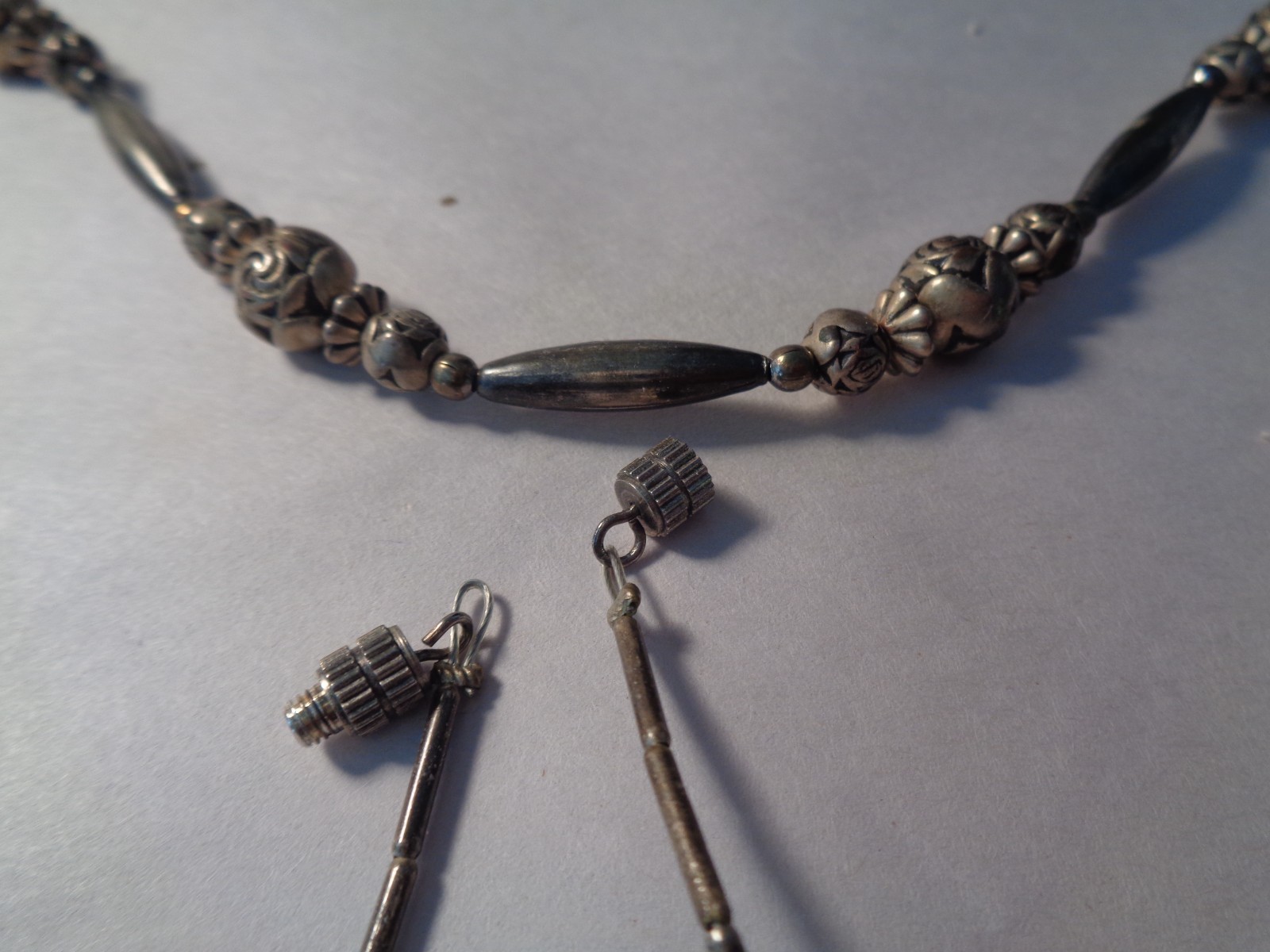 VINTAGE SOUTHWESTERN STYLE SILVER LIKE 28 INCH NECKLACE,BALLS,BARRELS,DISCS.