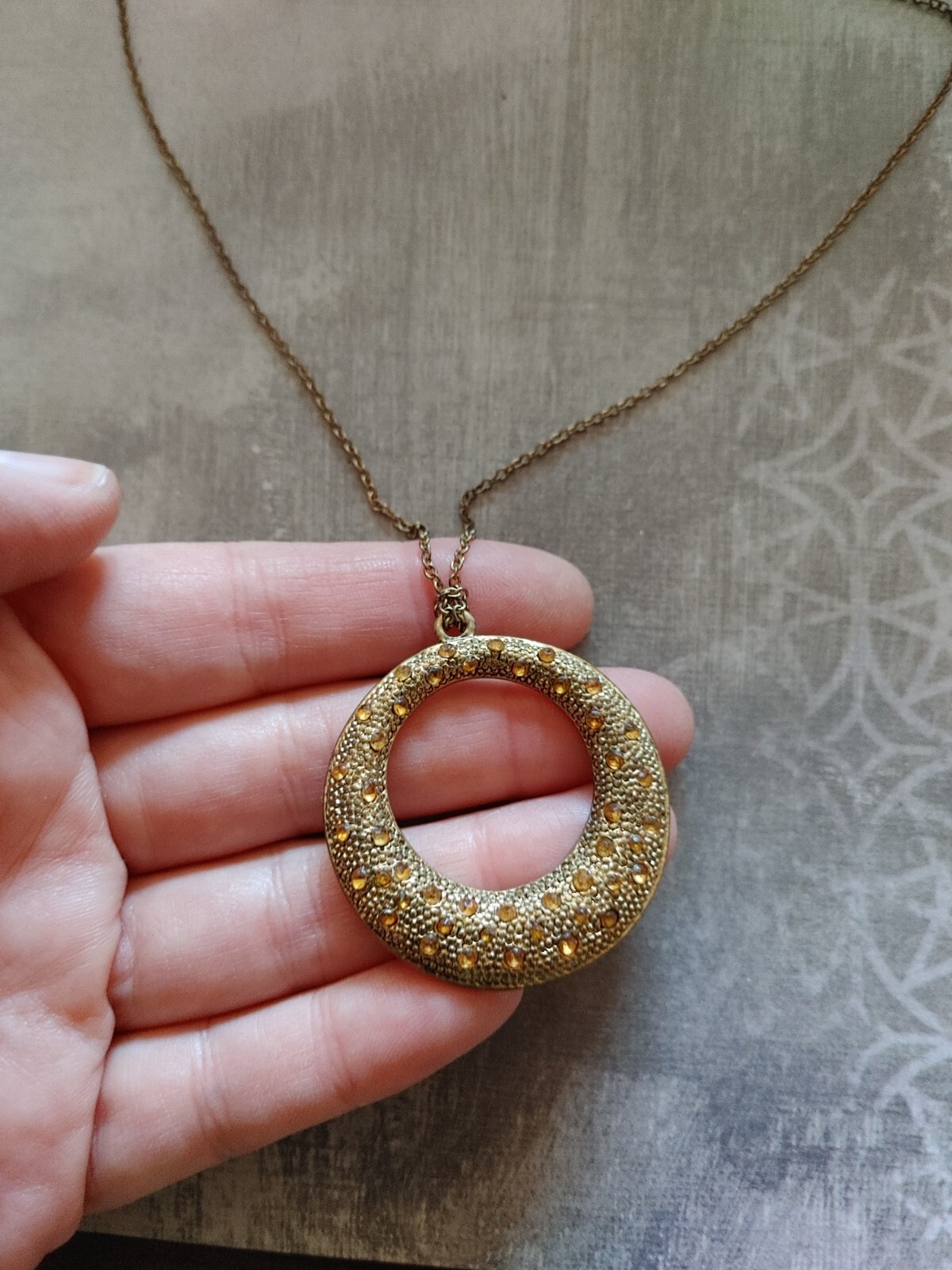 Vintage necklace gold tone metal circle yellow rhinestone signed Gwen