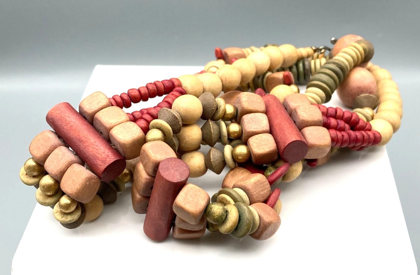 Muted Multi Strand Drape Necklace with Boho Wood Beads in Different Shapes and S