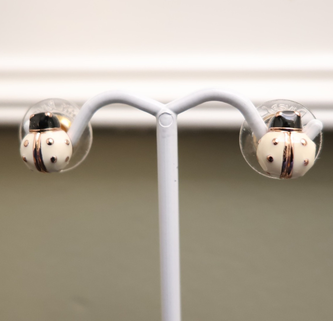Joan Rivers earrings ladybugs white black enamel signed rose goldtone studs