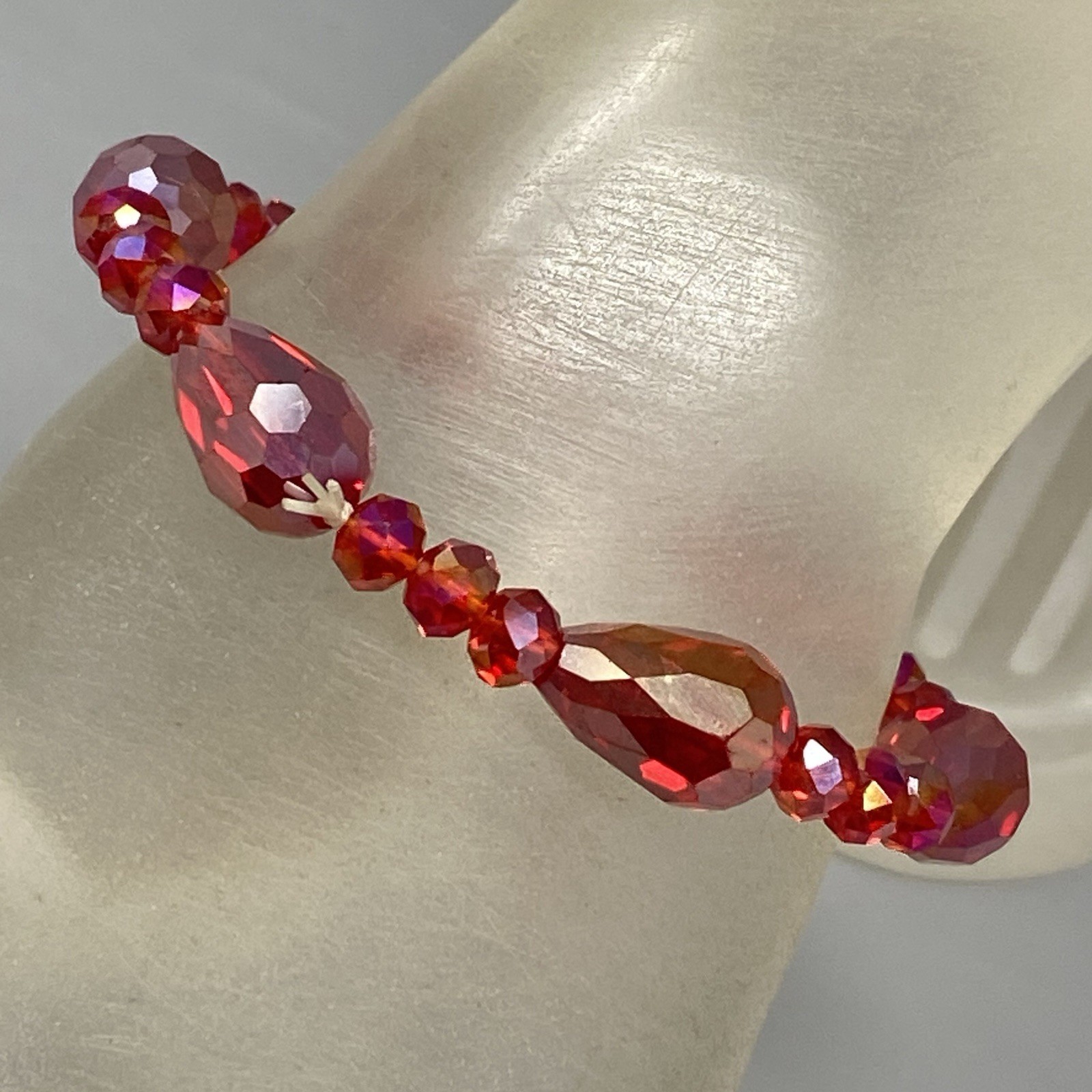 Red Glass Beaded Bracelet Surface Coated Faceted Teardrop Iridescent Stretch 6″