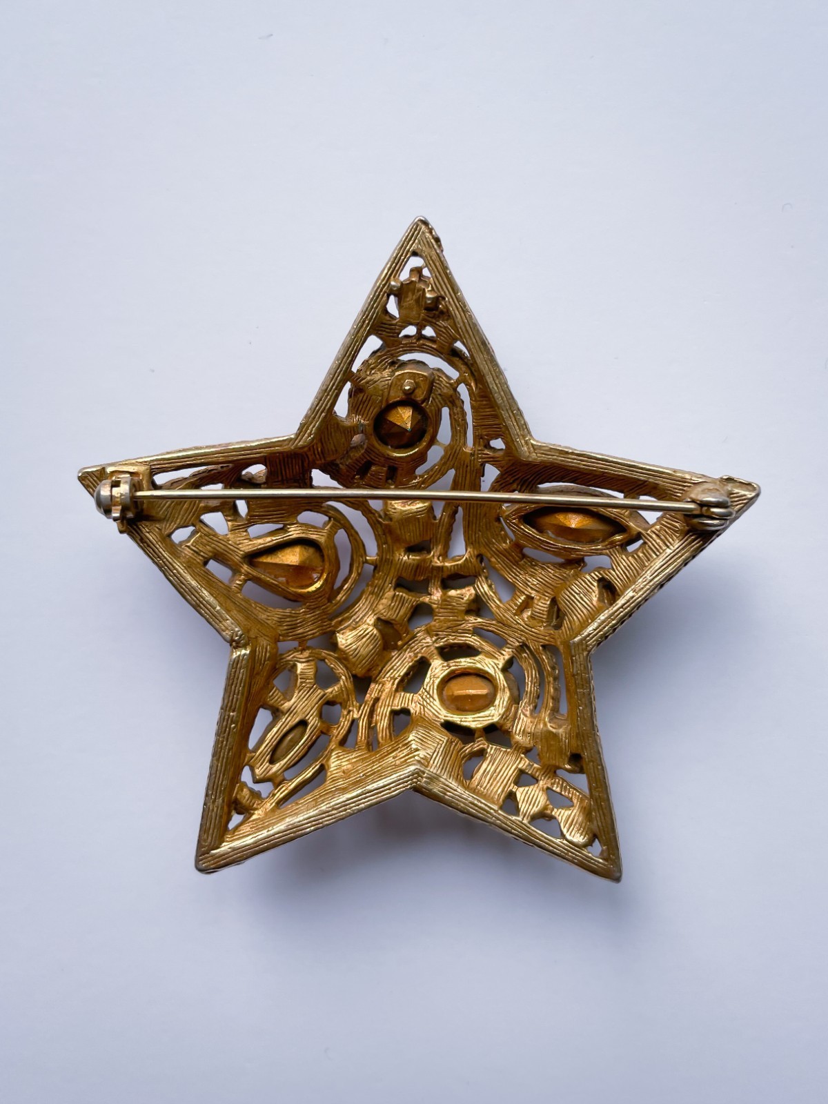 Vintage La Roca Gold Alloy Multicolor Rhinestone Star Brooch