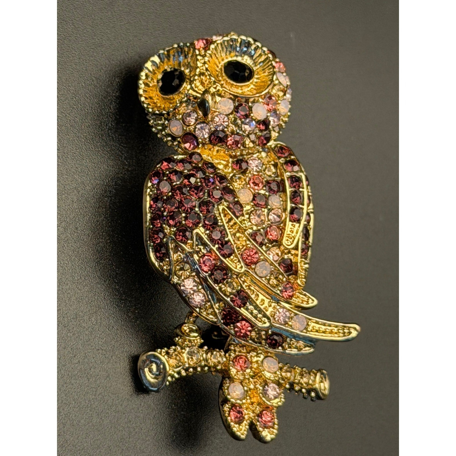 Vintage Monet gold-tone rhinestone owl brooch with purple, pink, white stones