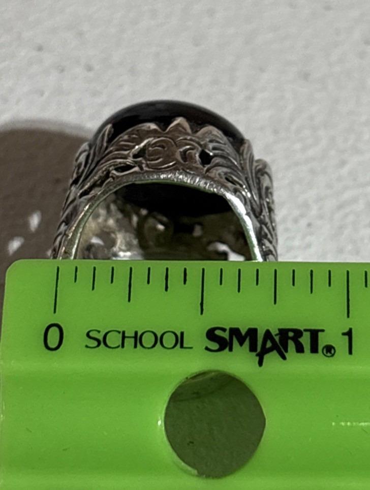 Vintage Silver‑Tone Ring with Black Onyx‑Style Cabochon Scrollwork Design