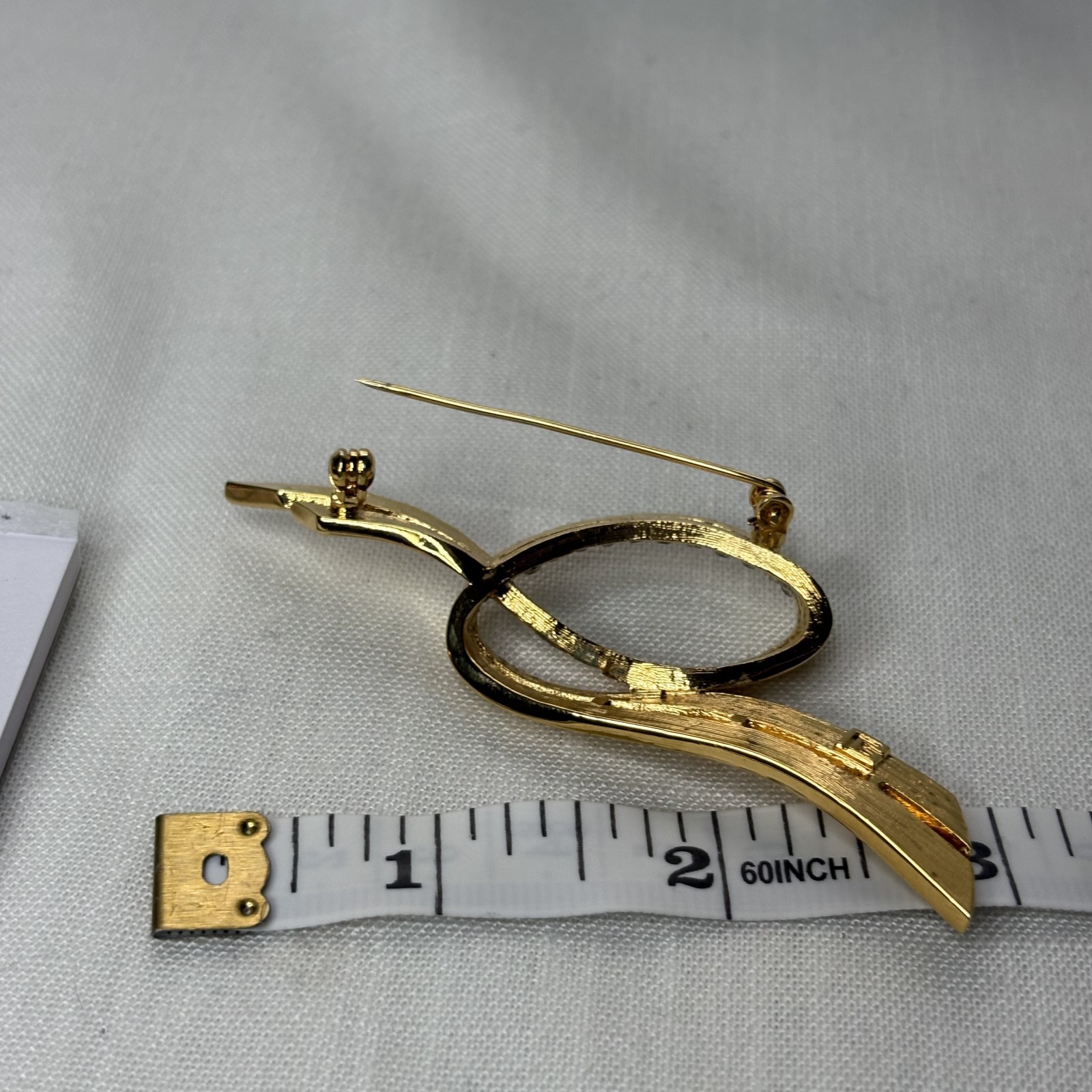 PIERRE BALMAIN Vintage Brooch Swirl Ribbon Gold Tone Rhinestone