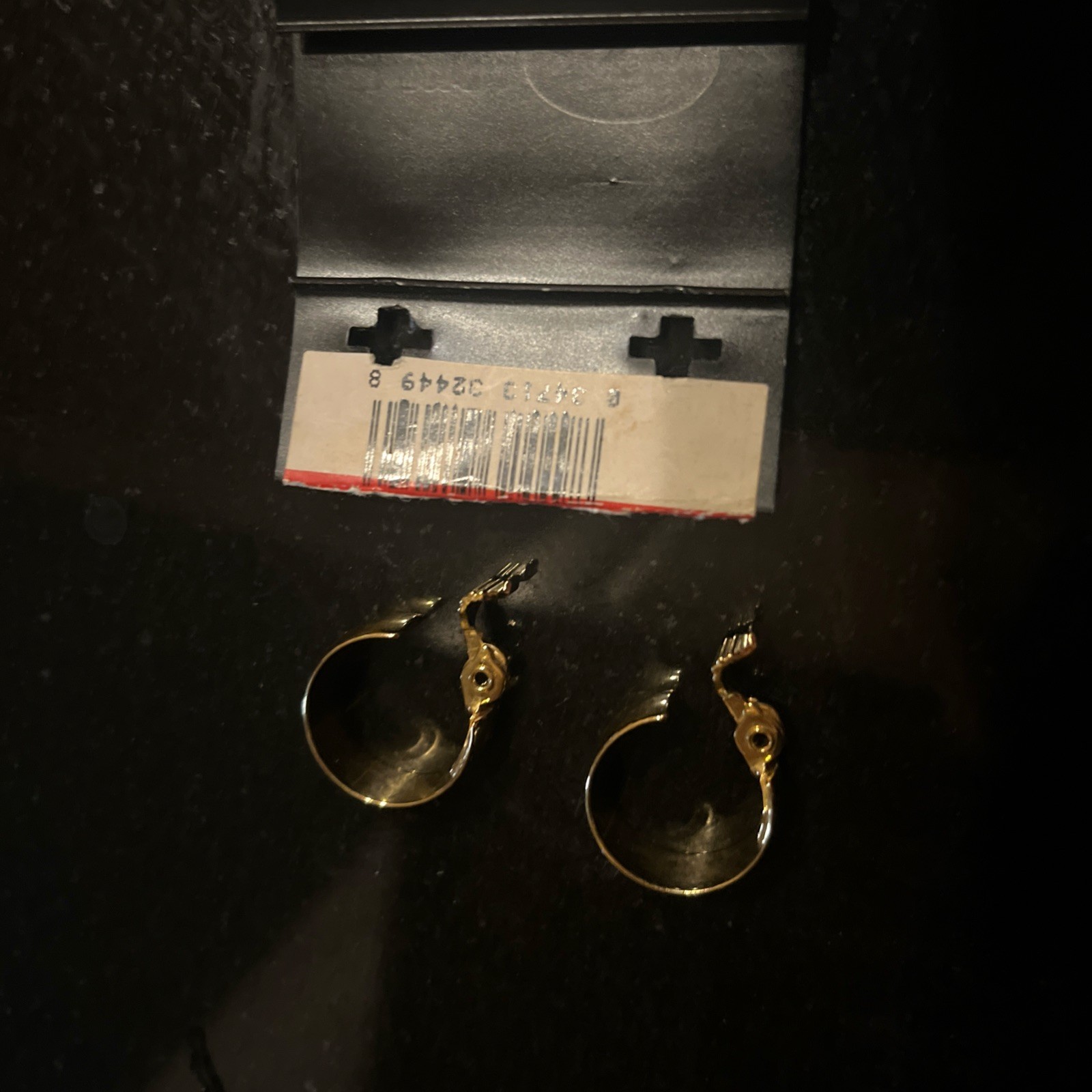 Vintage Monet wide huggie hoop clip on earrings polished gold tone finish