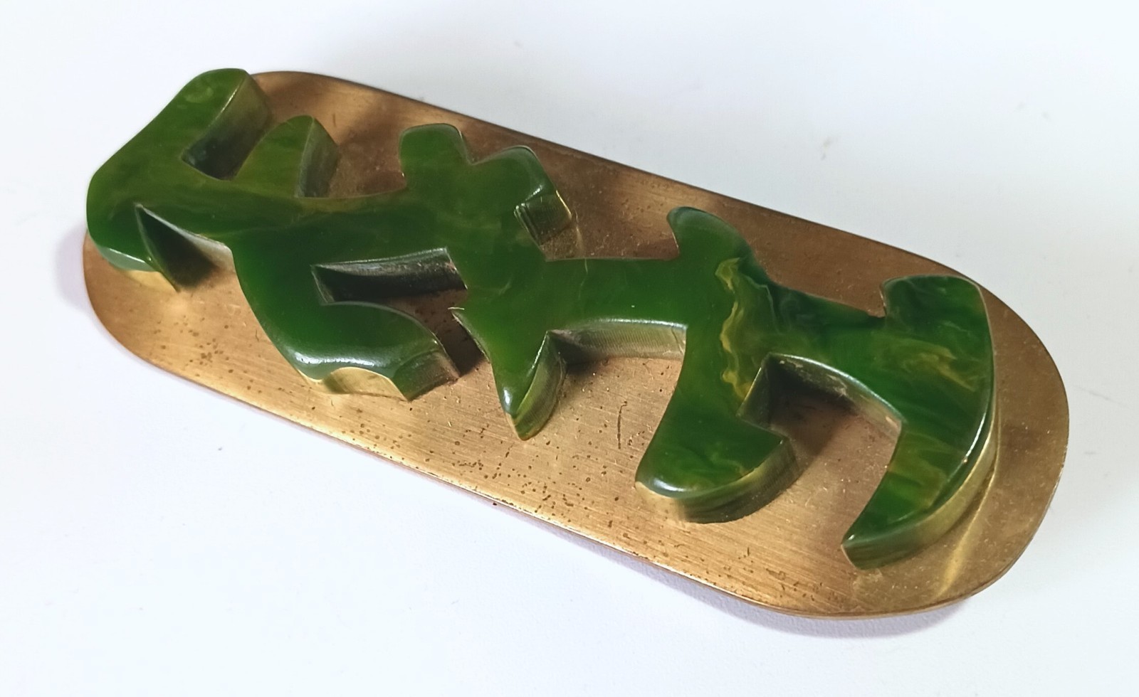 Vintage Art Deco Brooch: Carved Dark Green Bakelite on Polished Oval Brass Base
