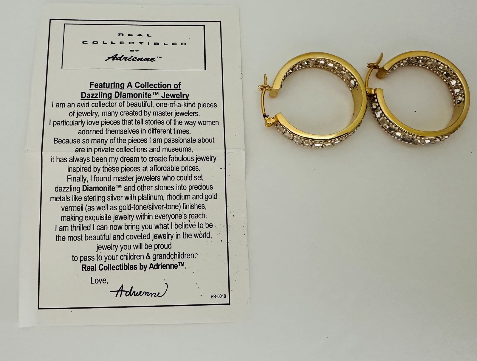 REAL COLLECTIBLES BY ADRIENNE Gold Tone Rhinestone Round Earrings 1”
