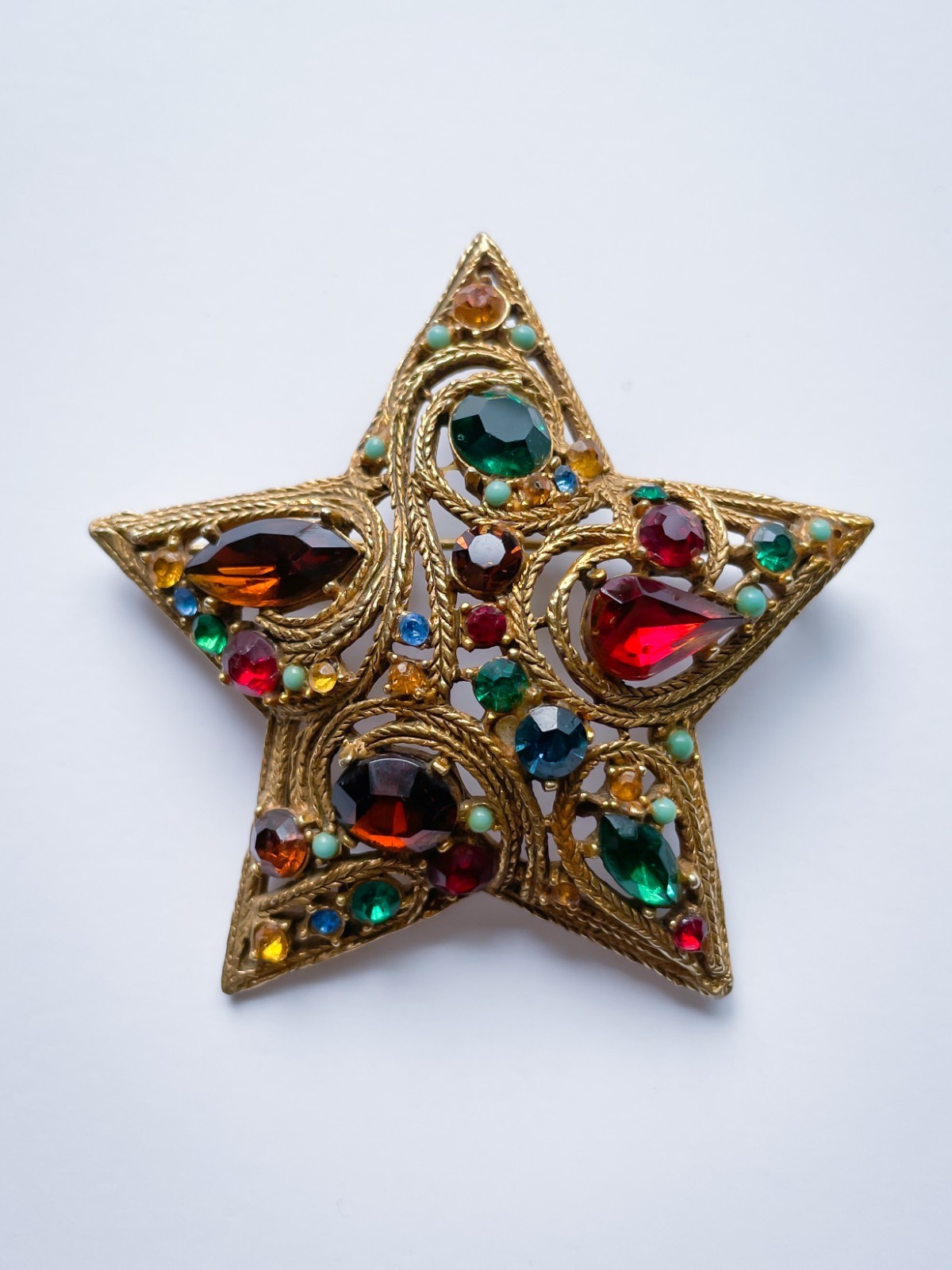 Vintage La Roca Gold Alloy Multicolor Rhinestone Star Brooch