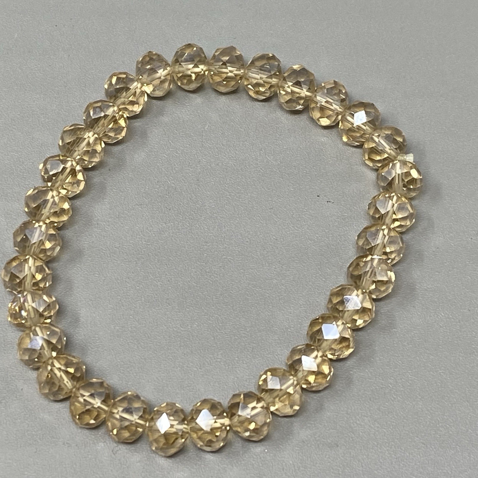Glass Beaded Bracelet Champagne Faceted Fire Polished Stretch Iridescent 7″