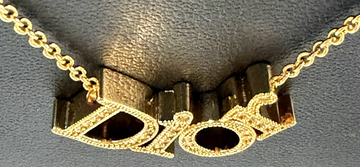 Christian Dior necklace pendant Features the DIOR logo rhinestones gold plating