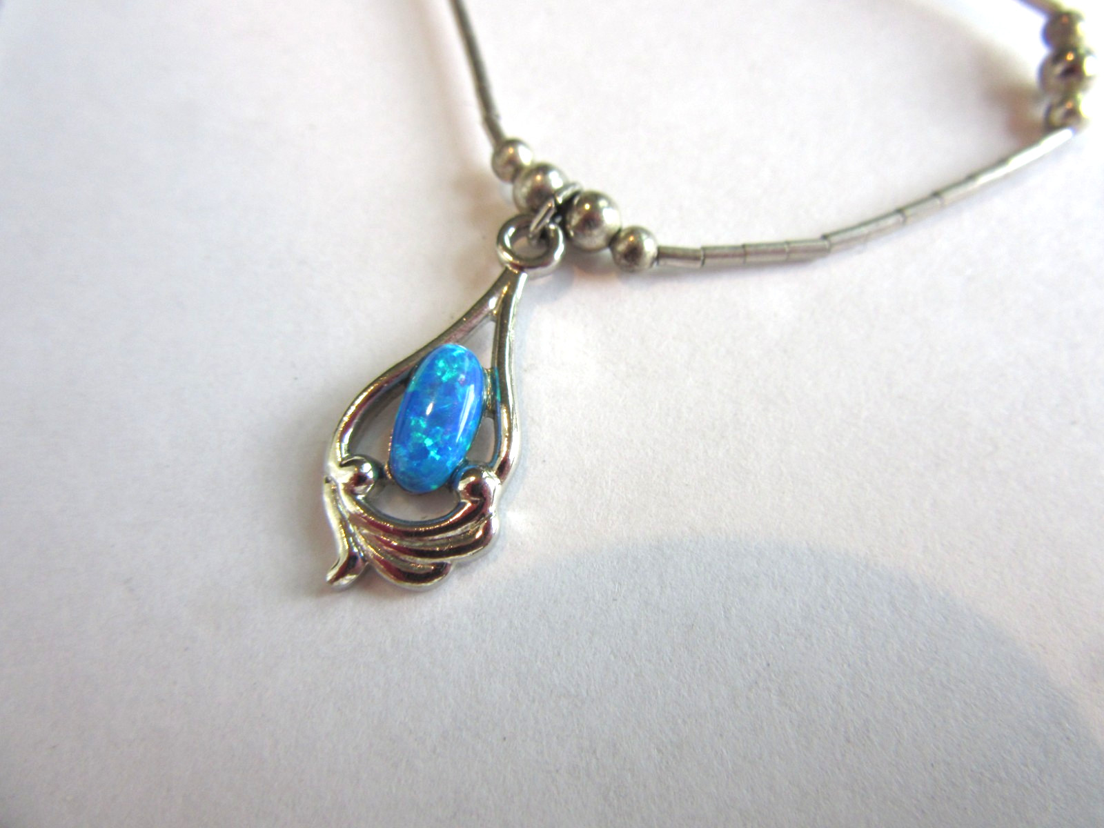 Vintage liquid silver beaded necklace with a blue opal pendant – 16.5″ long