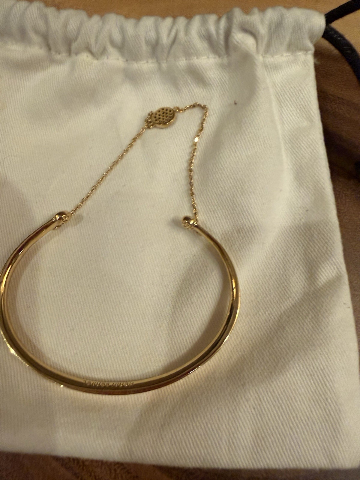 Henri bendel Gold Plated Petite Bangle Bracelet Blue Crystal Charm Safety Clasp