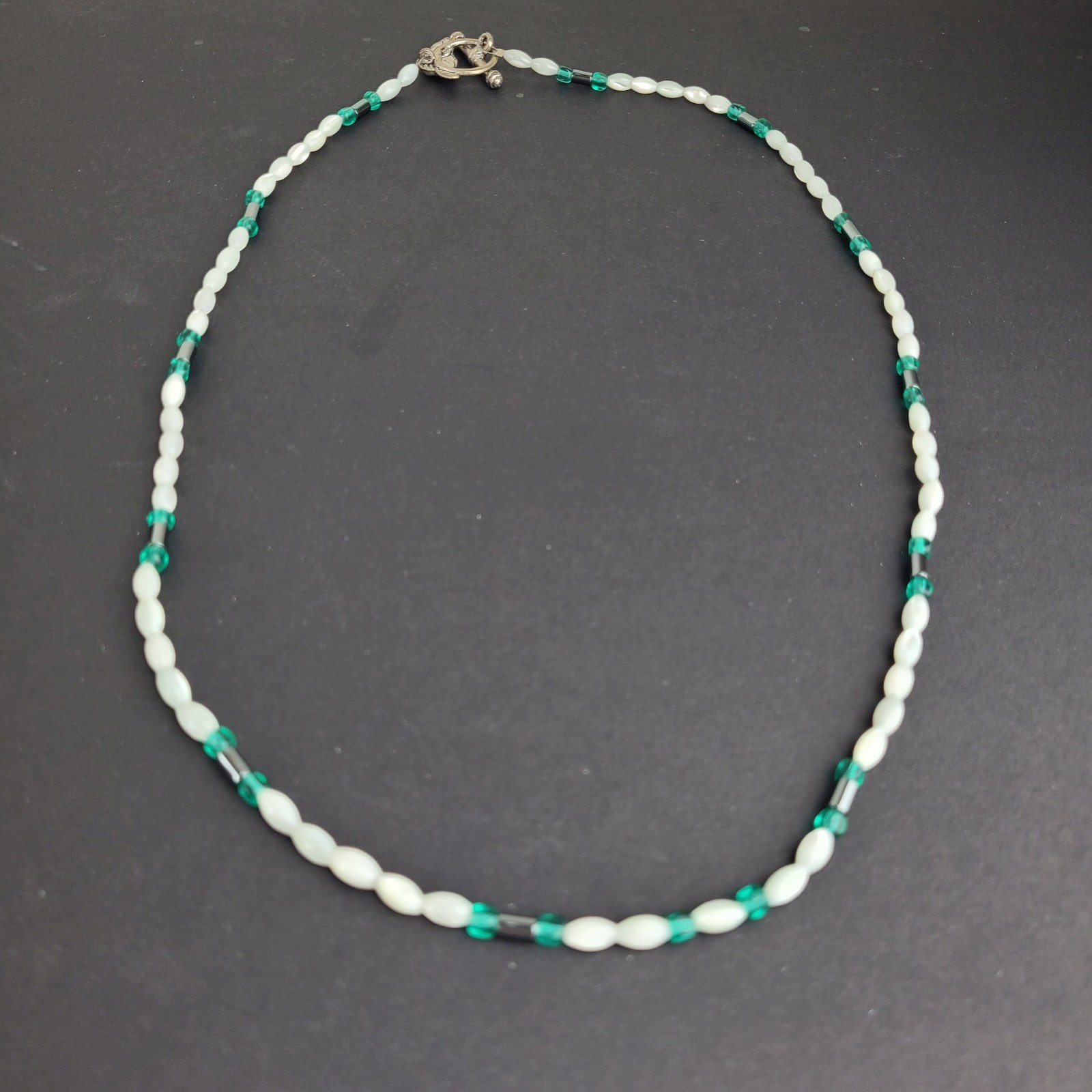 Mother Of Pearl Rice Bead Necklace With Green And Gray Bead Accents 22″