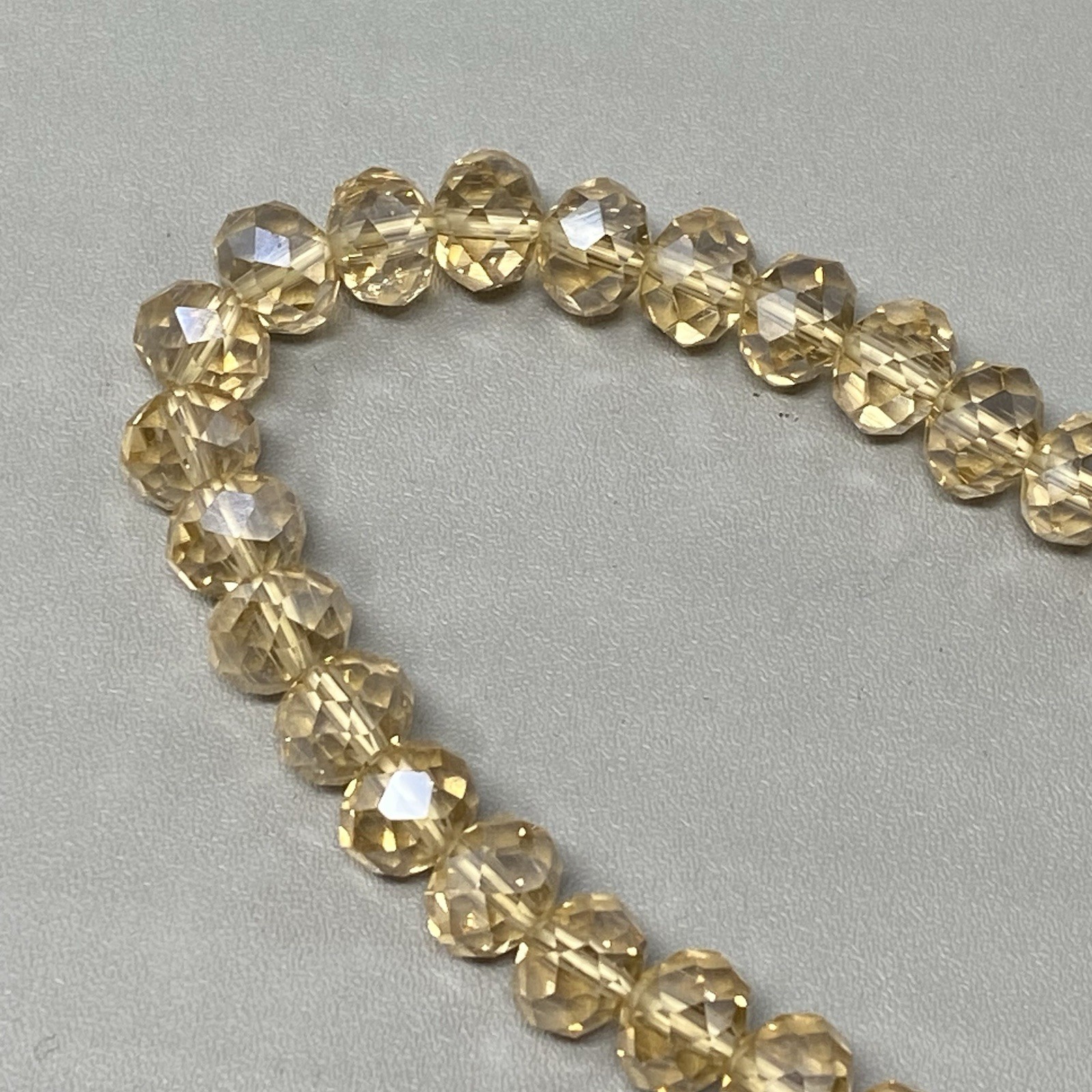 Glass Beaded Bracelet Champagne Faceted Fire Polished Stretch Iridescent 7″