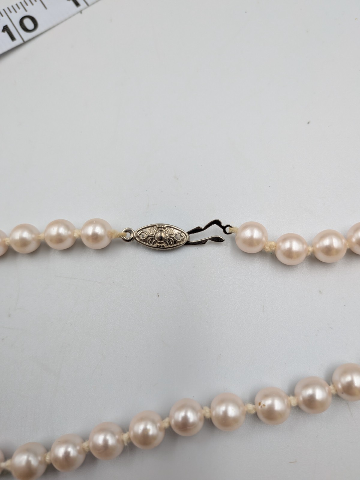 Vintage Faux Pearl Necklace Knotted with silver tone fish- hook clasp unbranded