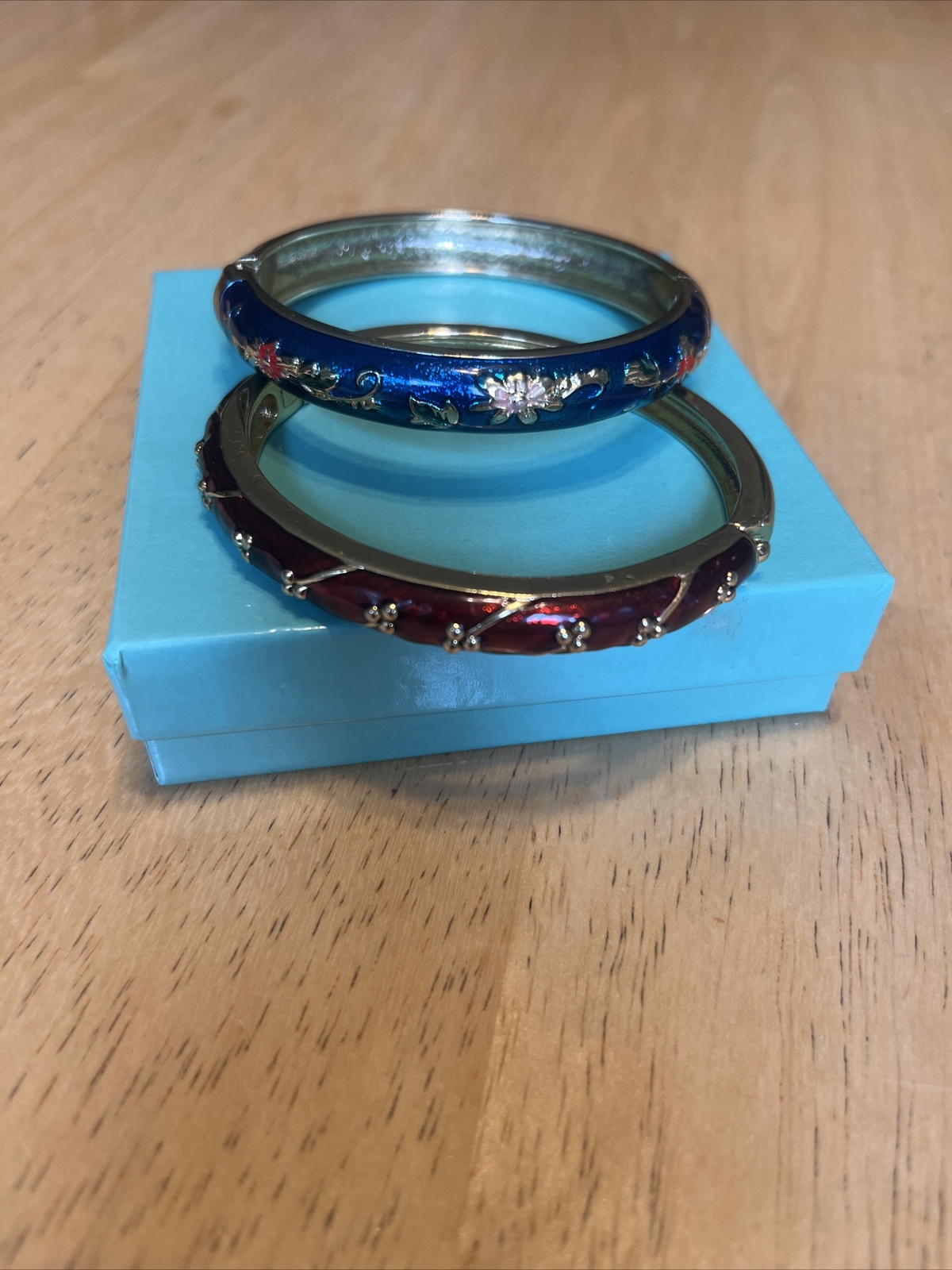 2 Gold Tone Enamel Bracelets Red (Marked Napier ) and Blue (not sure see pics)