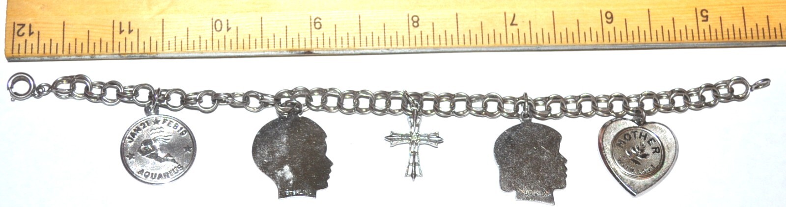 Vintage STERLING CHARM BRACELET cross, son, daughter, mom, aquarius .65 troy oz