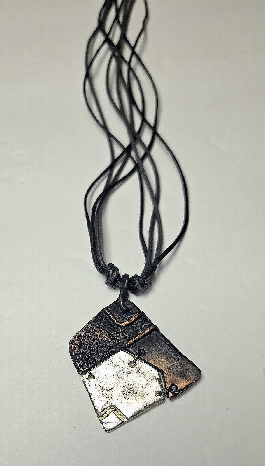 Vintage Handmade Organic Metal Abstract Pendent On Black Layered Cord