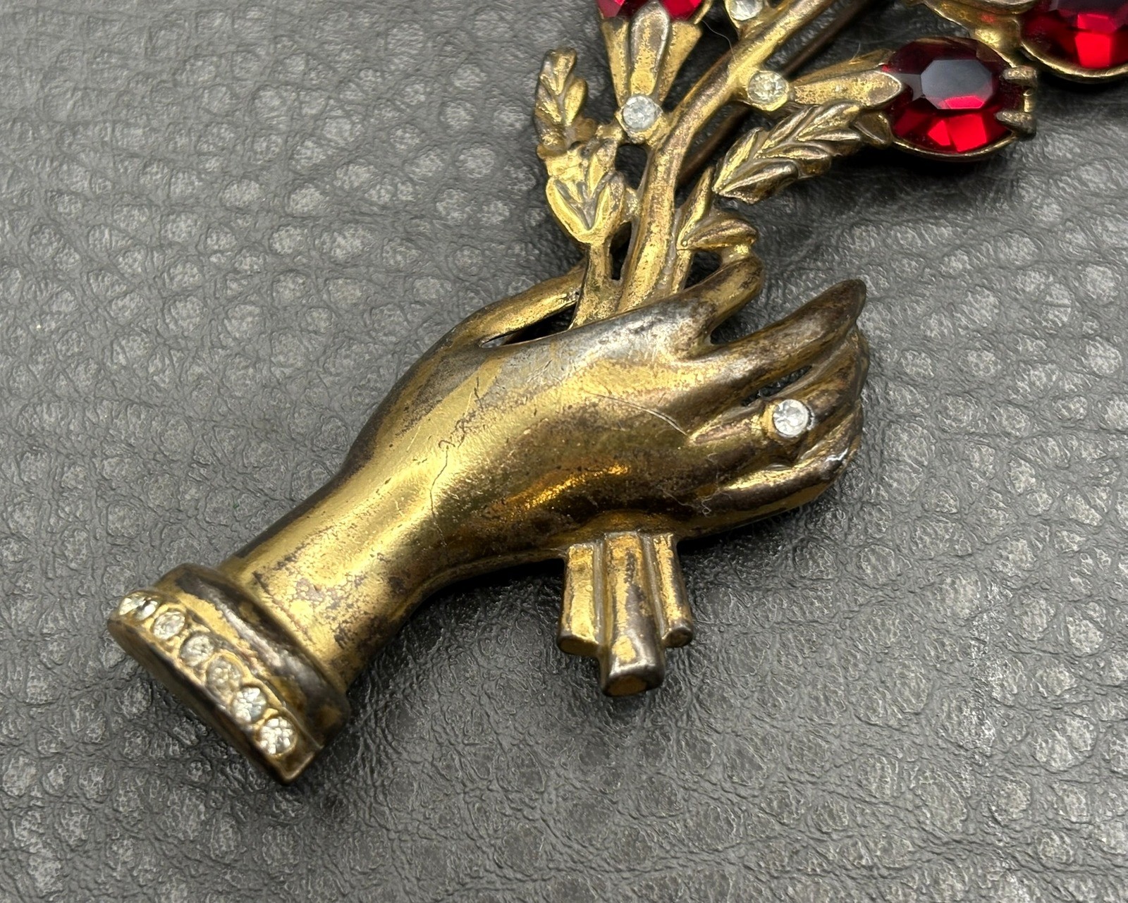 Vintage 4.25” HUGE Pot Metal Hand Holding Flowers Brooch Red Rhinestone