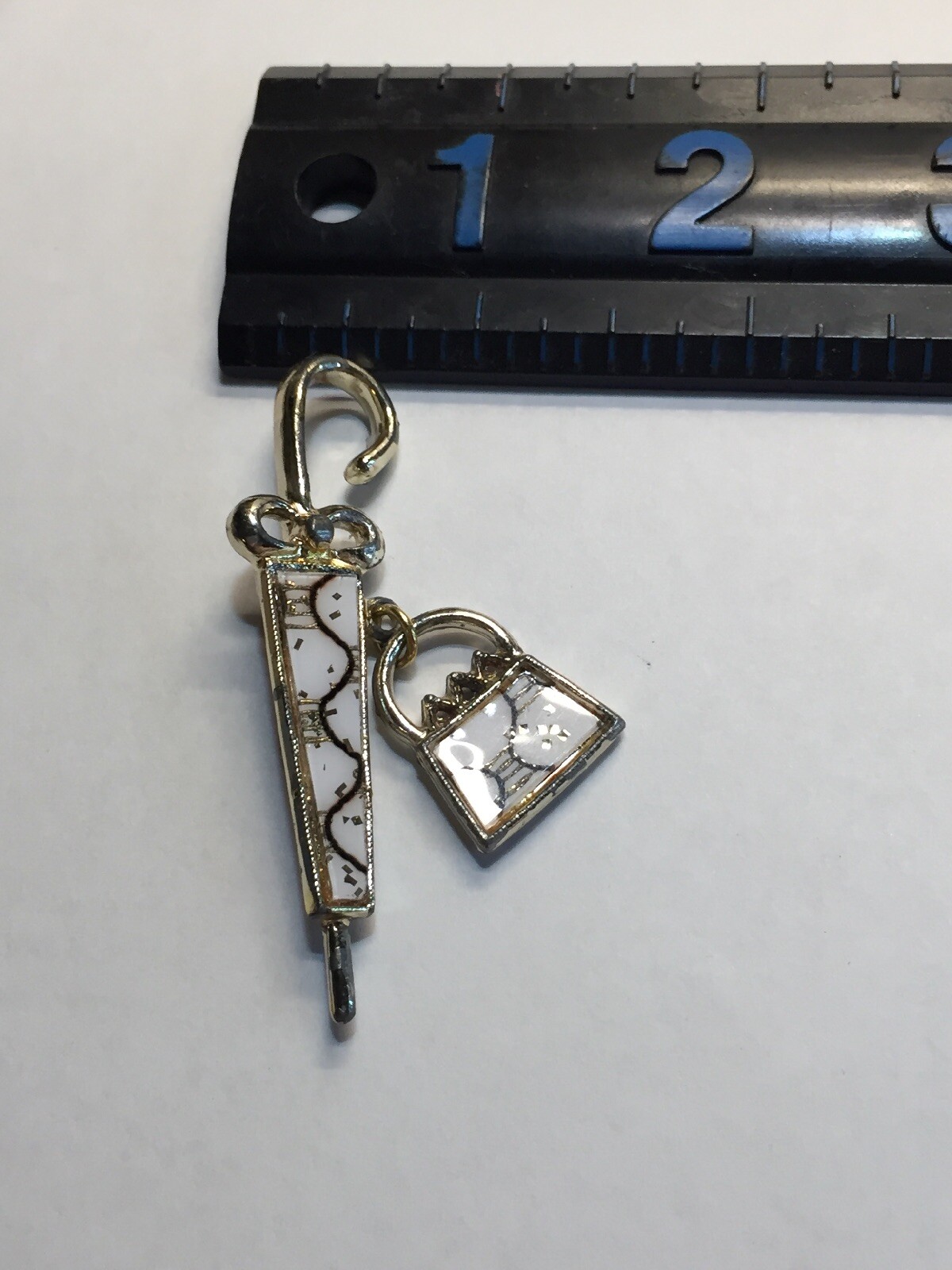 Vintage 2 3/8″ White Gold Enameled Umbrella w/Dangling Purse Brooch Pin