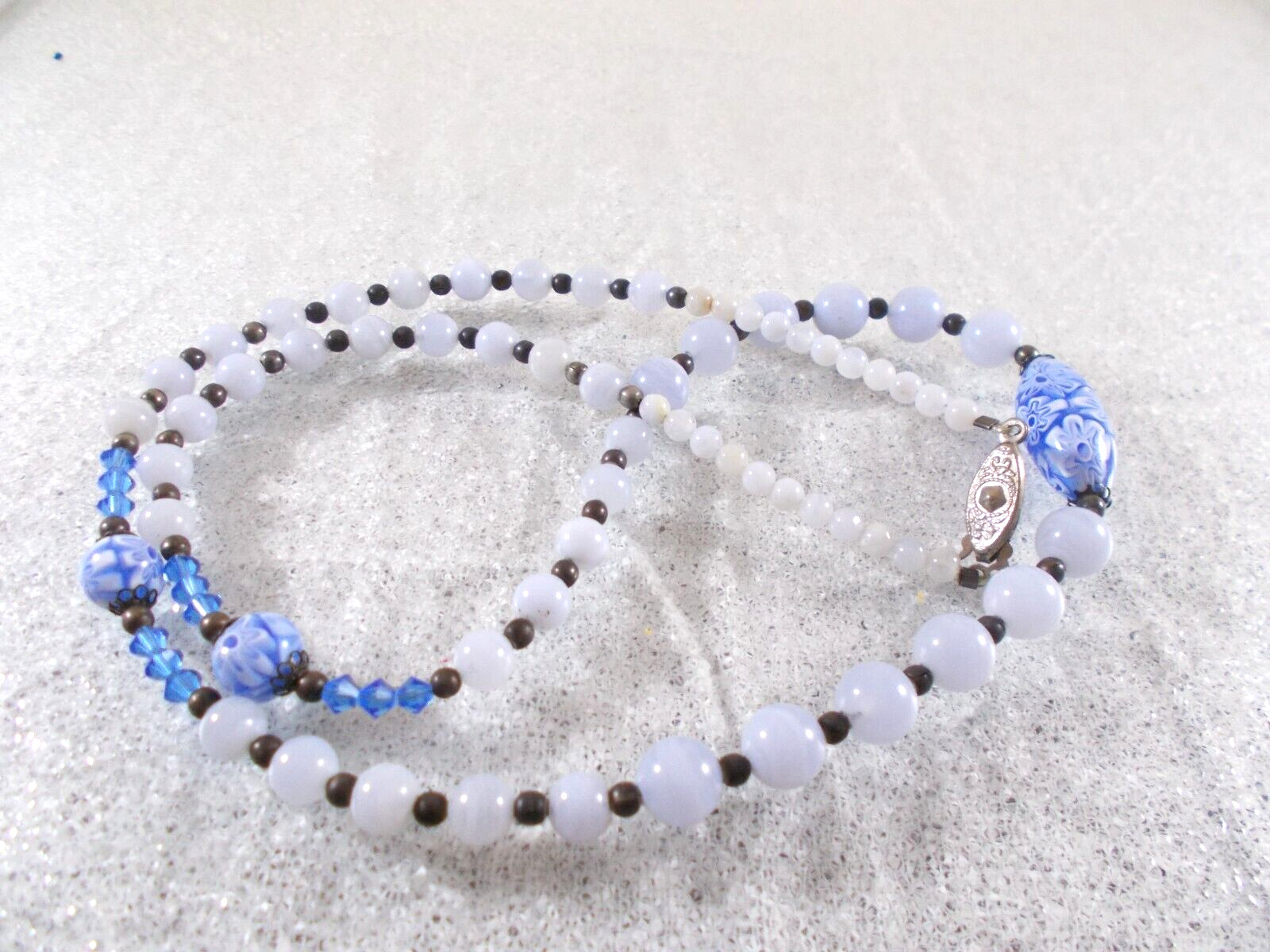 Graduated Blue Glass Bead Necklace with Millefiori Bead Accents Fish Hook Clasp