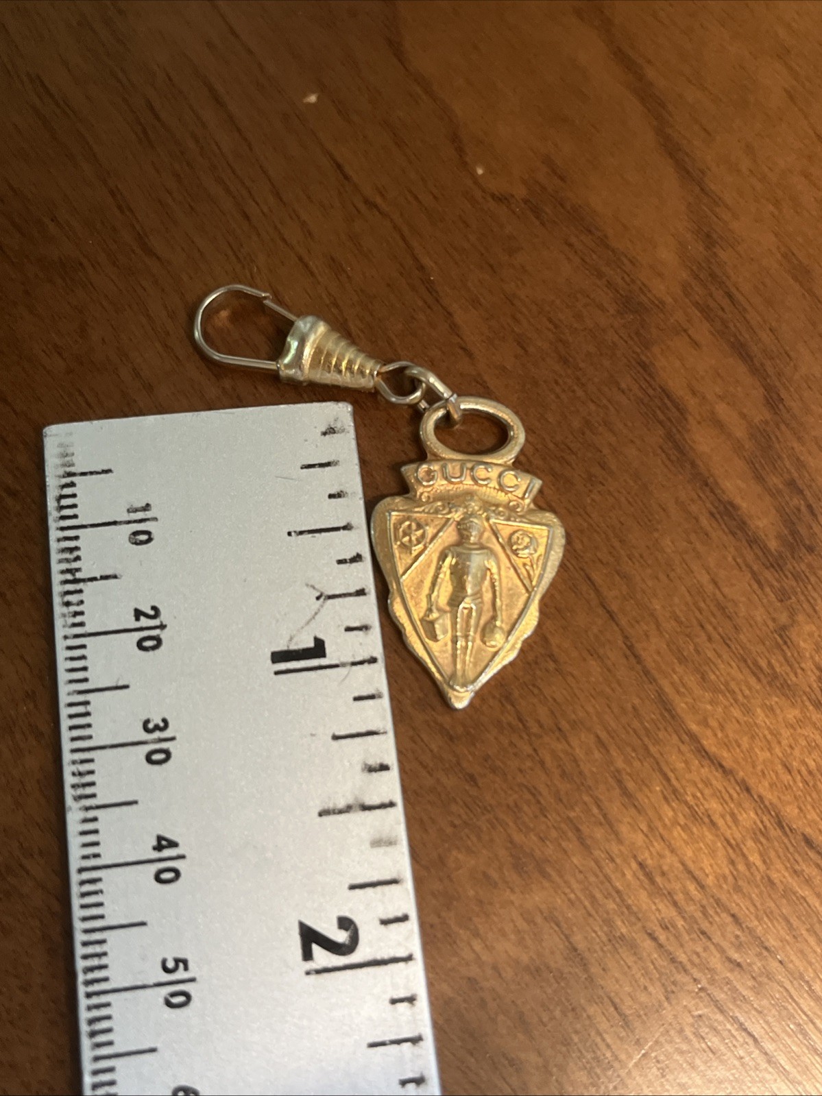Vintage Gucci Gold Tone Hangtag Zipper Pull Knight Crest Shield Charm Purse Keys