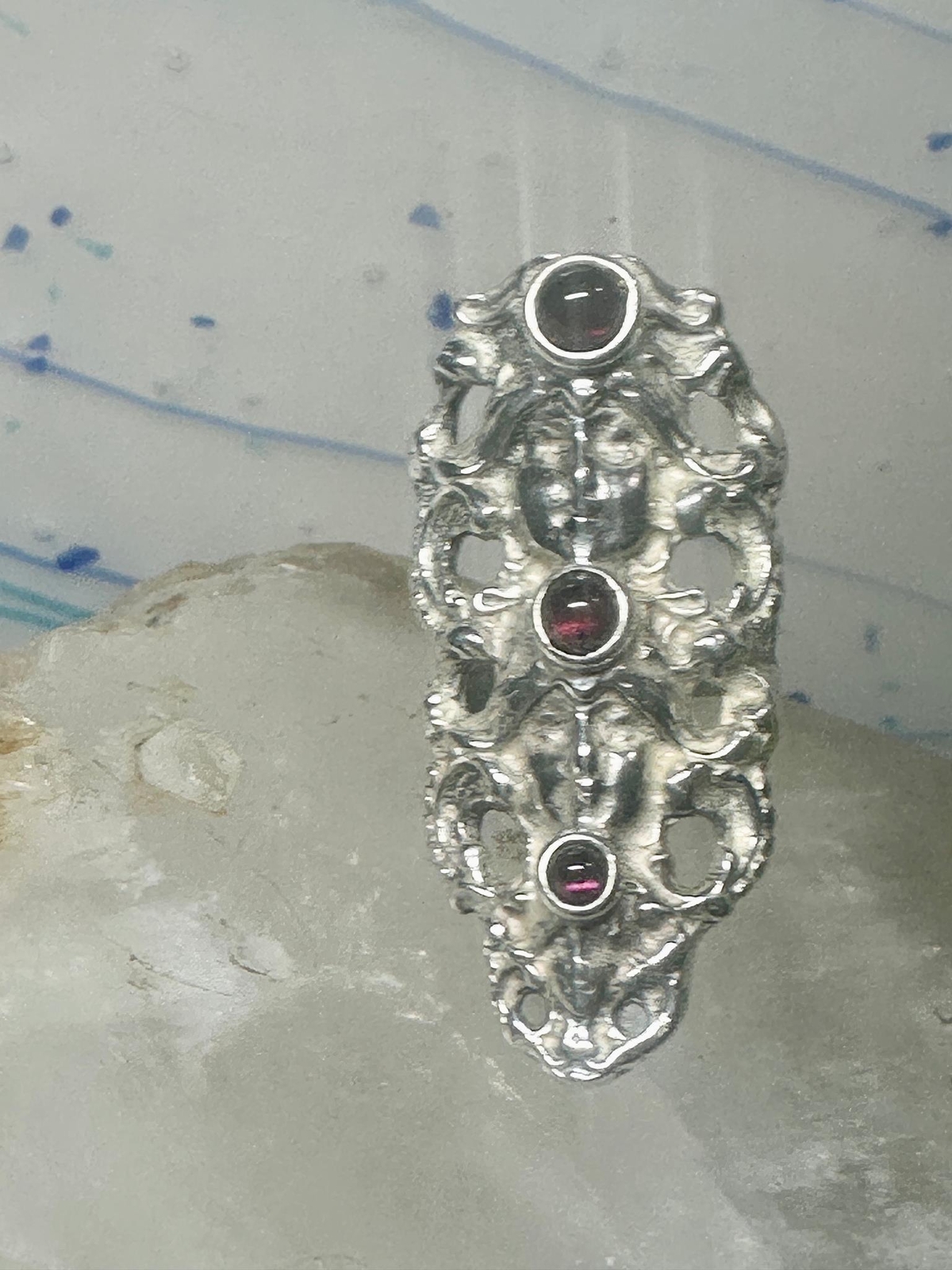Face ring long figurative Art Deco influences garnets size 5.75 sterling silver