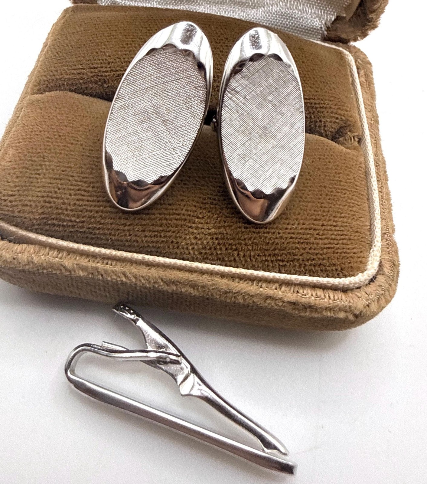Vintage Swank silver tone textured elongated oval cuff links and tie clip set