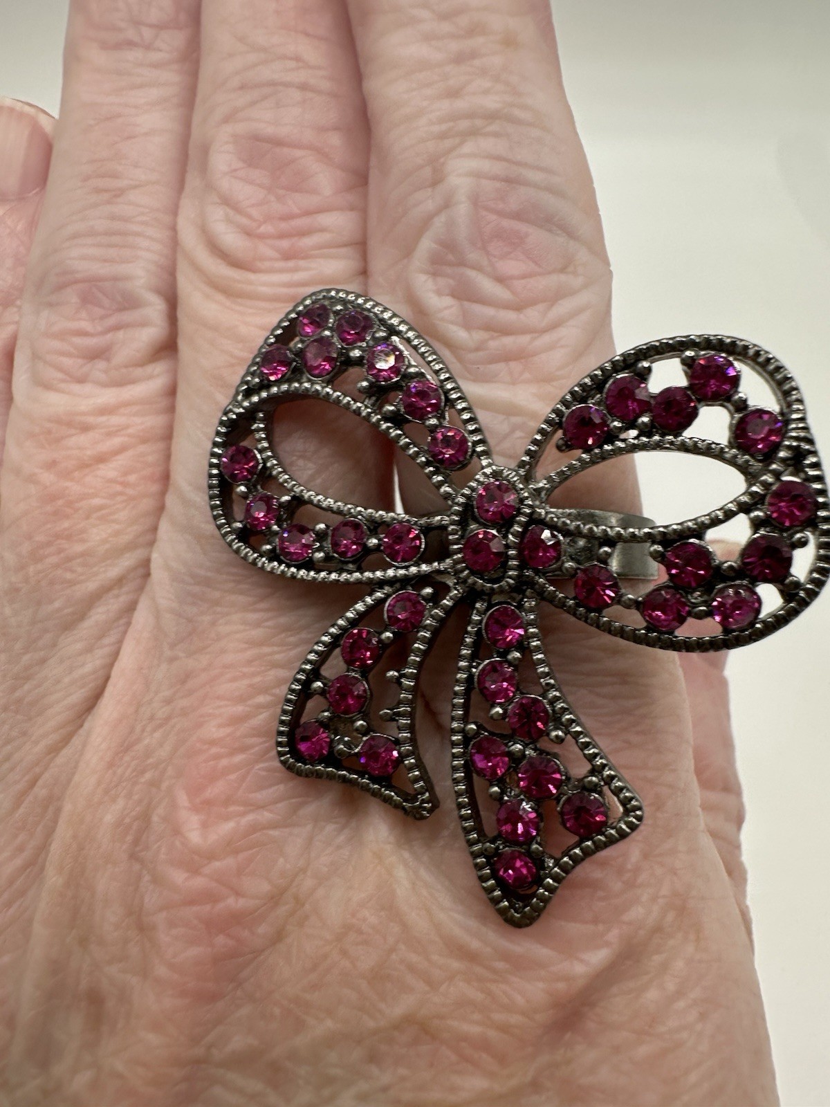 Large Gun Metal Tone Pink/Purple Rhinestone Bow Ring Adjustable