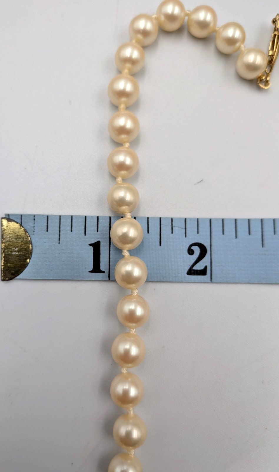 28 inch faux pearl necklace knotted with fish hook clasp unmarked vintage