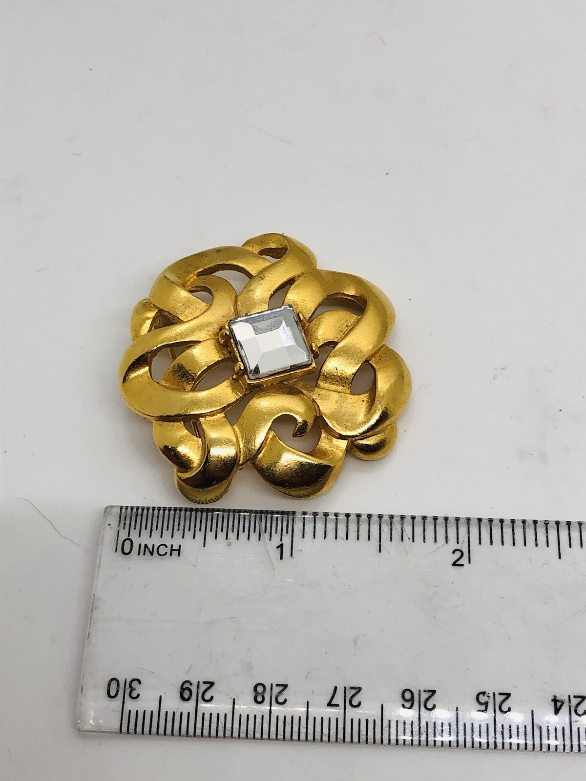 LCI Liz Claiborne brooch goldtone square rhinestone ribbon swirl brooch