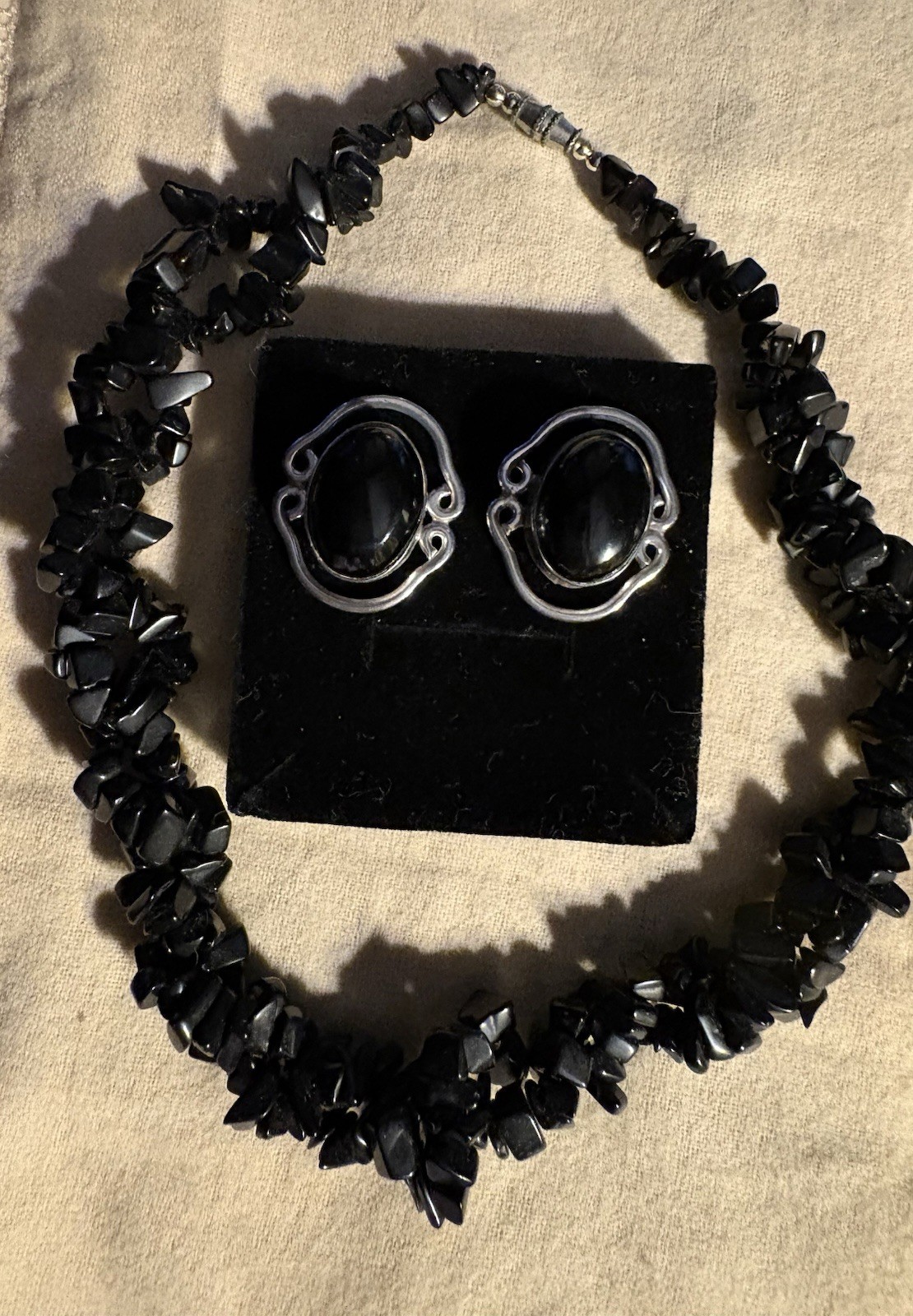 Vintage twisted strands of black coral with matching coral & silver earrings