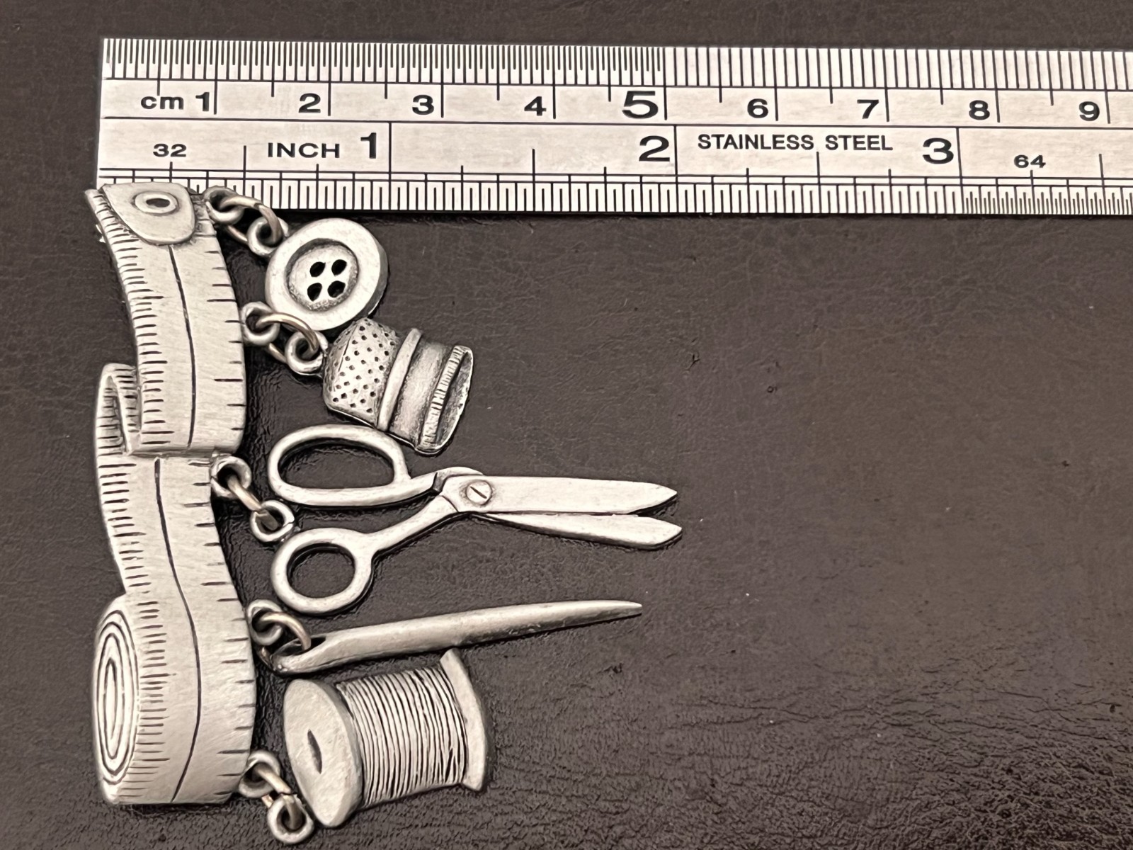 Vintage 80s Sewing Brooch Charms on Tape Measure Signed JJ Silver Tone Lapel Pin