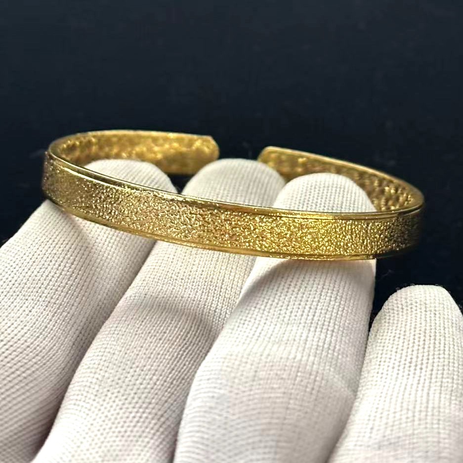 Golden Cuff Bangle Bracelet Gold-wash (NOT SURE) marked ‘999’, 7.5 in adjustable