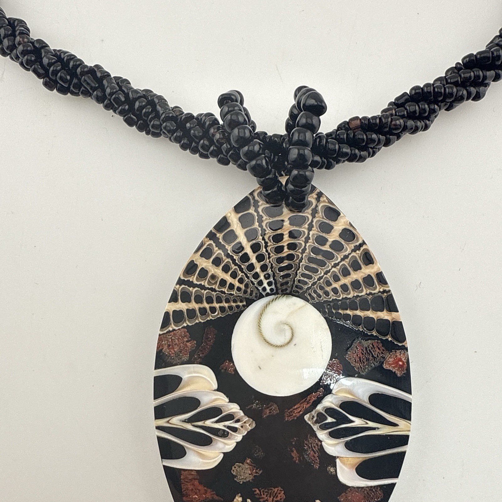 Sajen Necklace Onyx Inlay Beaded Shell Artisan Pendant Oval Black Artsy Tribal