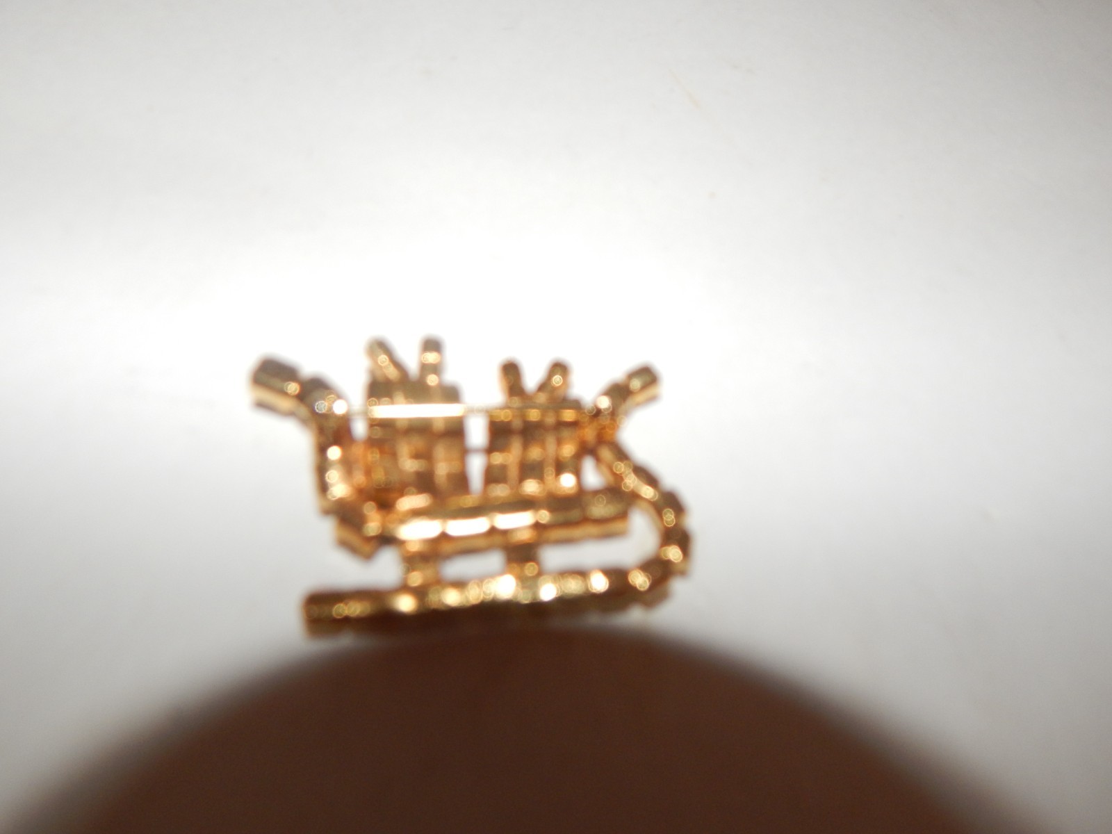 Vintage Gold Tone Green Red Rhinestone Present Holiday Sleigh Pin Brooch
