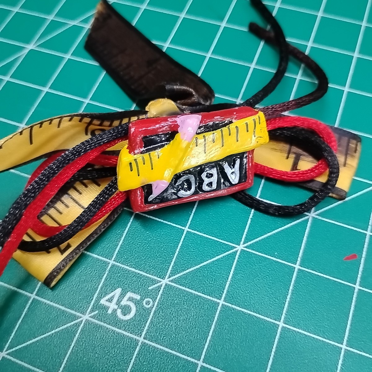Vintage ABC Chalk Board Tape Measure Cord Teacher Pin Brooch