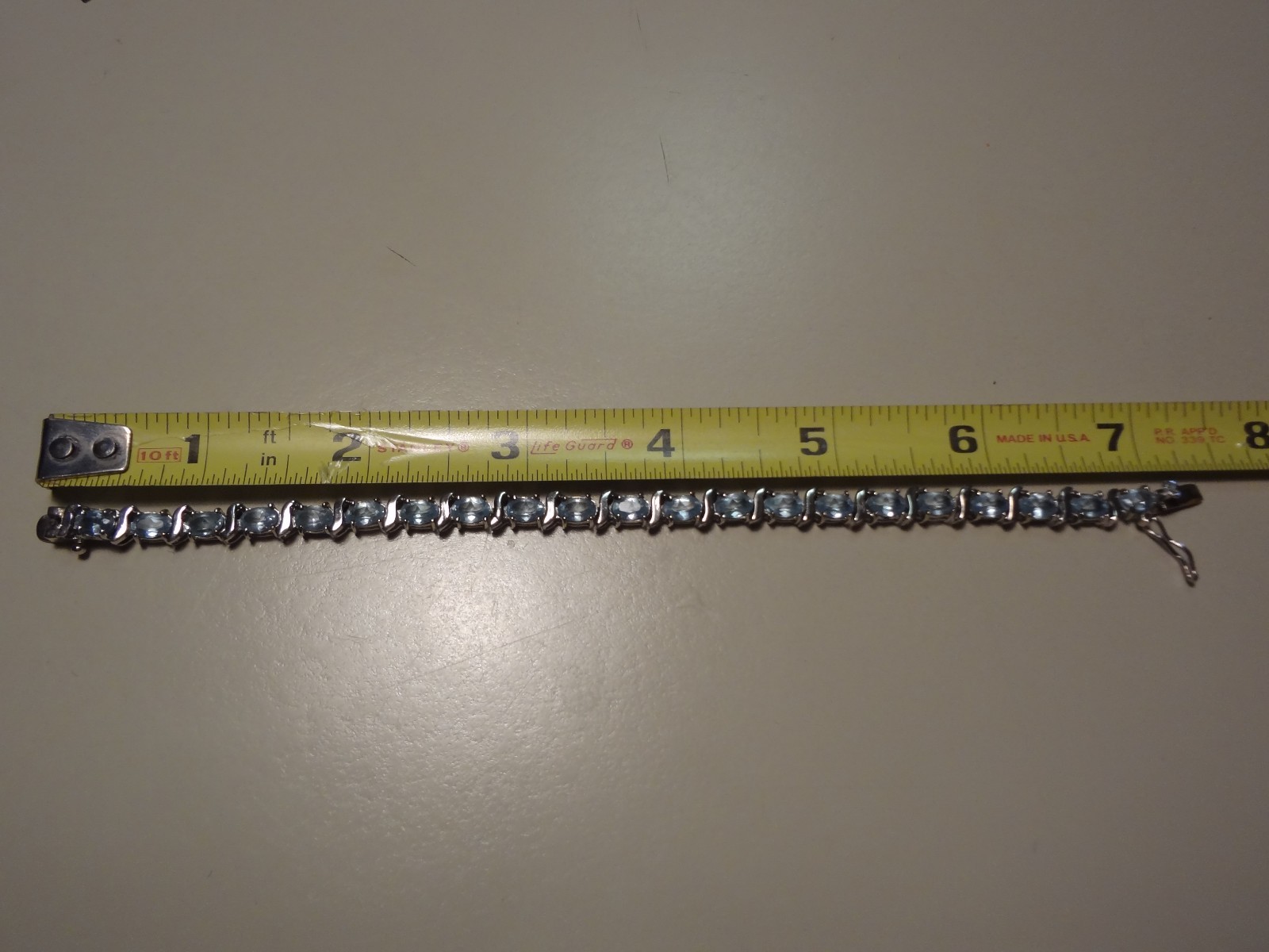 #48-DBJ-925 STERLING SILVER BRACELET LOADED WITH BEAUTIFUL STONES